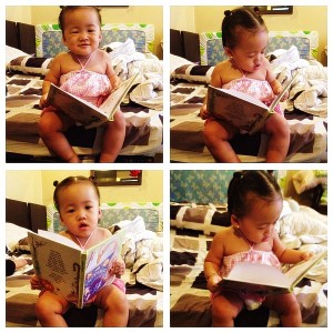 Daphnee enjoying her Mother Goose personalized book!